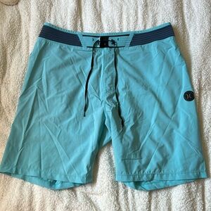 Blue Hurley Board Shorts, 31 waist and 7 inch inseam.